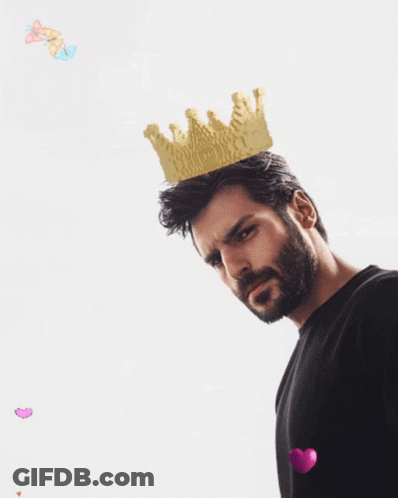 A Man With A Beard Wears A Gold Crown On His Head GIF