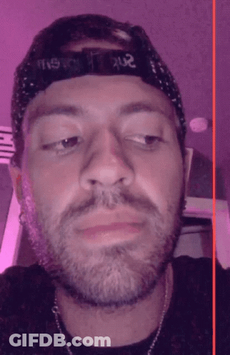 A Man With A Beard Wears A Hat That Says ' Ns ' On It GIF
