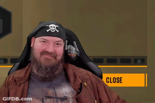 A Man With A Beard Wears A Pirate Hat And Holds A Bottle Of Beer GIF