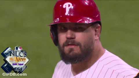 A Man With A Beard Wears A Red Helmet With The Letter P On It GIF