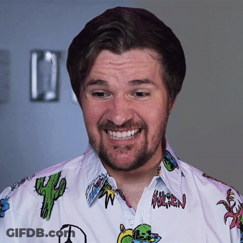 A Man With A Beard Wears A Shirt With A Cactus On It And The Word Warren On The Front GIF