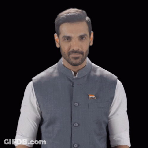 A Man With A Beard Wears A Vest With An Indian Flag On It GIF