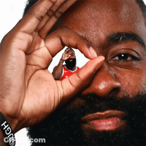 A Man With A Beard Wears A Wristband That Says Enough On It GIF