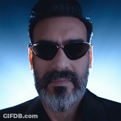 A Man With A Beard Wears Sunglasses And A Black Jacket GIF