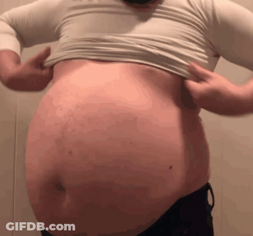 A Man With A Big Belly Is Wearing A White Shirt GIF