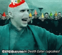 A Man With A Birthday Hat On His Head Says " We 'Ve Even Made Death Eater Cupcakes " GIF