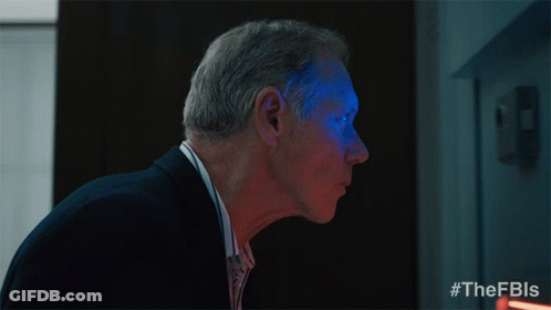 A Man With A Blue Light On His Face Has The Hashtag #Thefbls On The Bottom GIF