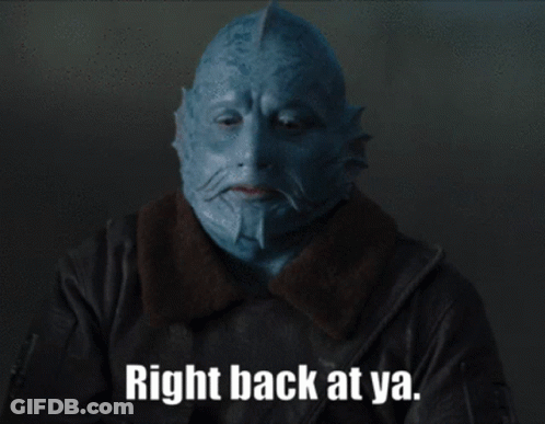 A Man With A Blue Mask On His Face Says Right Back At Ya GIF