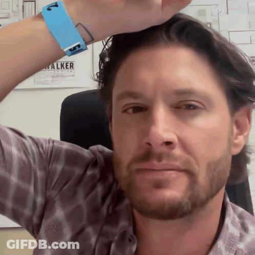 A Man With A Blue Wristband That Says Walker GIF