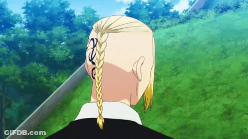 A Man With A Braided Haircut Has A Tattoo On His Forehead GIF