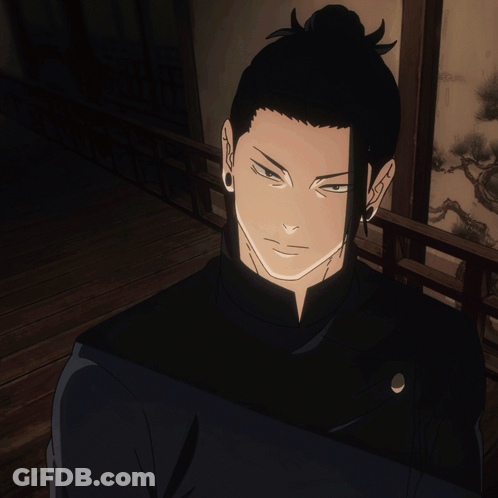 A Man With A Bun On His Head Is Giving The Thumbs Up GIF