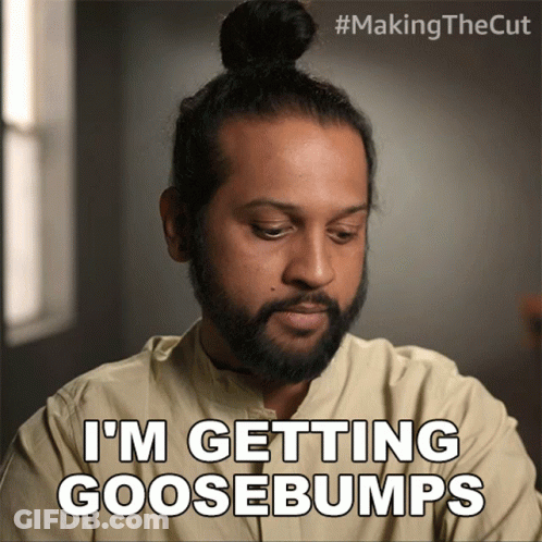 A Man With A Bun On His Head Says I 'M Getting Goosebumps GIF