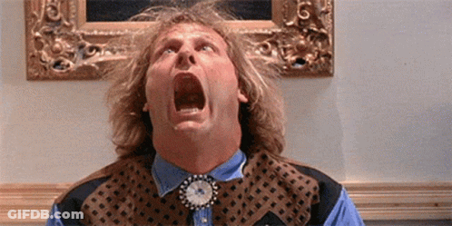 A Man With A Clock On His Neck Is Screaming With His Mouth Open GIF