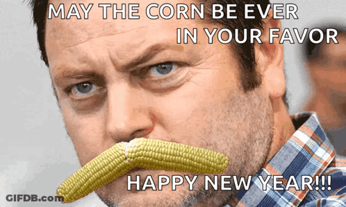 A Man With A Corn On The Cob In His Mouth GIF