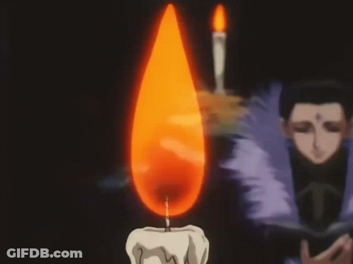 A Man With A Cross On His Forehead Is Reading A Book GIF