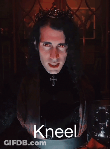 A Man With A Crown On His Head And The Word Kneel On The Bottom GIF