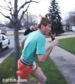 A Man With A Crown On His Head Is Drinking A Beer GIF