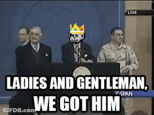 A Man With A Crown On His Head Stands At A Podium With The Words Ladies And Gentleman We Got Him GIF
