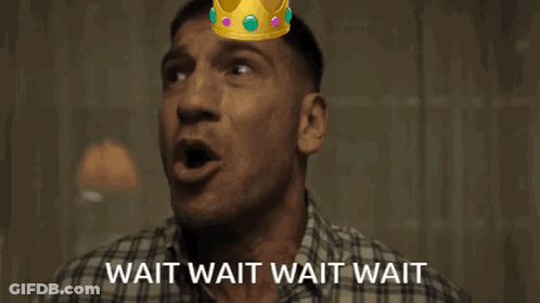 A Man With A Crown On His Head With The Words Wait Wait Wait Wait GIF