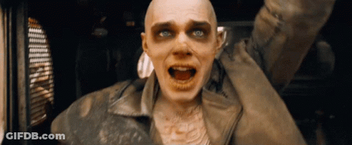 A Man With A Dirty Face And A Dirty Jacket Is Screaming GIF
