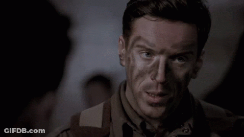 A Man With A Dirty Face Says " No Idea " In A Dark Room GIF
