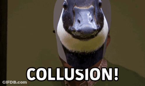 A Man With A Duck On His Head And The Words Collusion Below It GIF