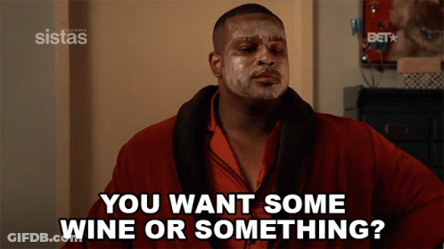 A Man With A Face Mask Says " You Want Some Wine Or Something ? " GIF