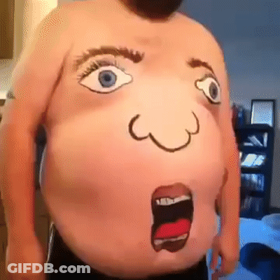 A Man With A Face Painted On His Belly GIF