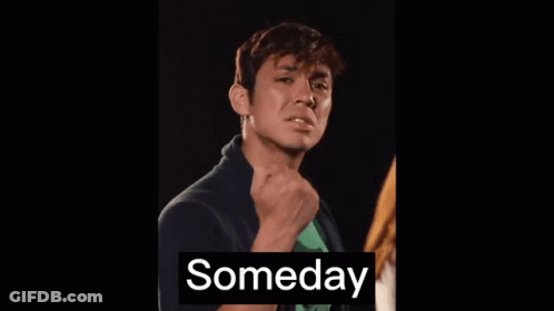A Man With A Fist In The Air And The Word Someday Behind Him GIF