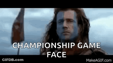 A Man With A Flag On His Face And The Words `` Championship Game Face '' Written Above Him . GIF