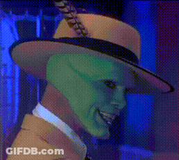 A Man With A Green Mask And A Yellow Hat GIF