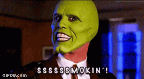 A Man With A Green Mask On His Face Says Ssss Smokin ' ! GIF