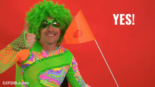 A Man With A Green Wig And Sunglasses Holds An Orange Flag And Says " Maybe " GIF