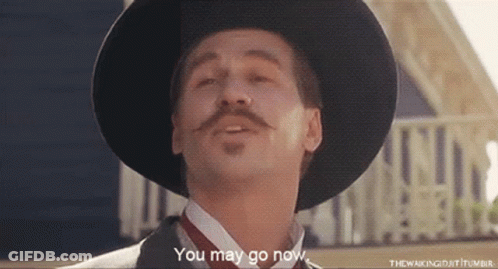 A Man With A Hat And A Mustache Says You May Go Now GIF