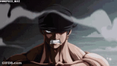 A Man With A Hat On His Head Is Looking At The Camera GIF