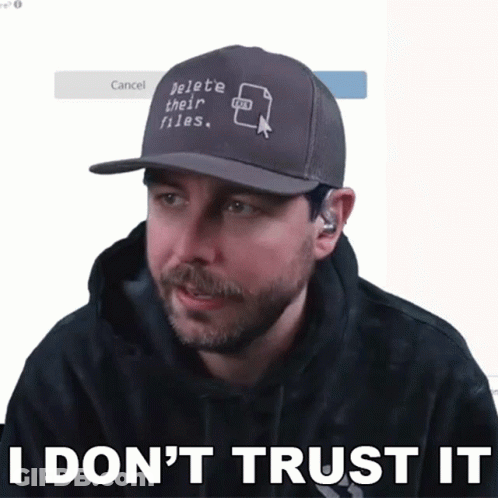 A Man With A Hat That Says Delete Their Files GIF