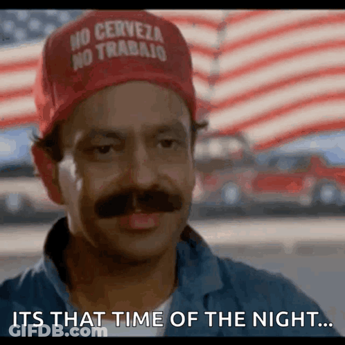 A Man With A Hat That Says No Cerveza No Trabajo On It GIF