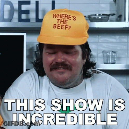 A Man With A Hat That Says Where 'S The Beef GIF