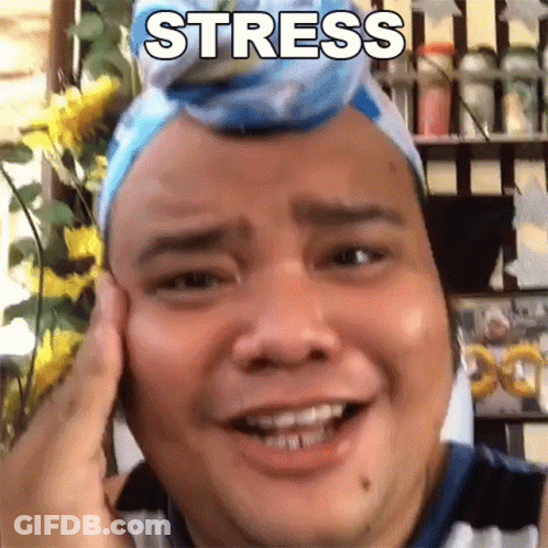 A Man With A Headband On His Head Has The Word Stress Written On His Face GIF