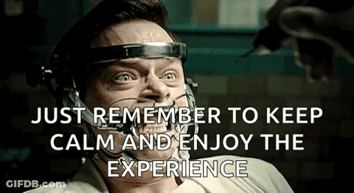 A Man With A Headband On His Head Is Being Injected With A Syringe And Says Just Remember To Keep Calm And Enjoy The Exp GIF