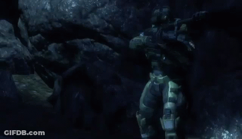 A Man With A Helmet And A Badge That Says A On It GIF