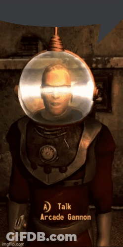 A Man With A Helmet On His Head Is Talking To Arcade Gannon GIF