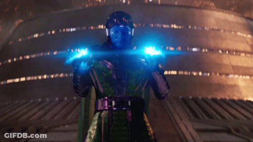 A Man With A Helmet On Is Holding A Blue Light In His Hands GIF