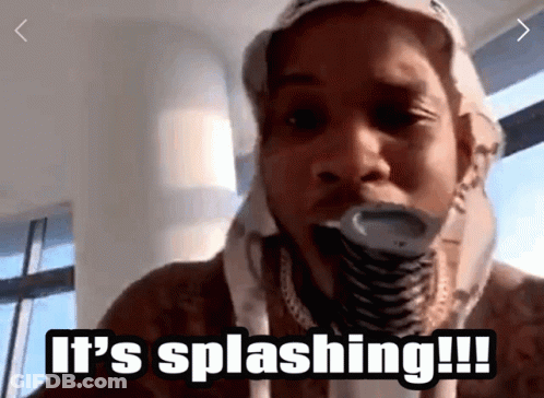 A Man With A Hose In His Mouth Says It 'S Splashing GIF