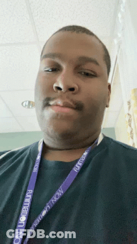 Man Wearing Lanyard Saying Animation Now GIF