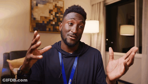 A Man With A Lanyard Around His Neck That Says ' Tcl ' On It GIF
