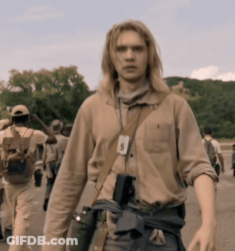 A Man With A Lanyard Around His Neck With The Number 5 GIF