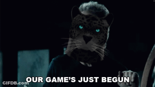 A Man With A Leopard 'S Head Is Holding A Guitar And Says `` Our Game 'S Just Begun '' . GIF