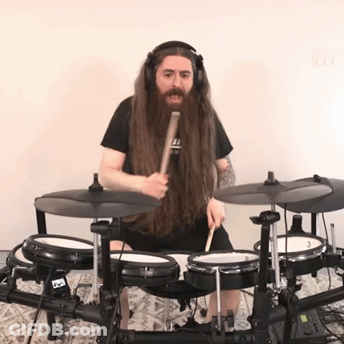 Man With Long Beard Playing Drums GIF