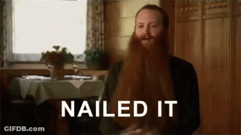 A Man With A Long Red Beard Is Sitting At A Table In A Restaurant And Says `` Nailed It '' . GIF